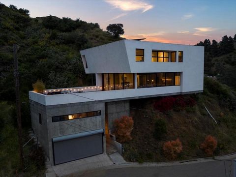 A home unlike any other, 2353 San Marco is a true architectural masterpiece of avante-garde industrial design with a creative heart and soul, perched high above Hollywood Dell. Designed and custom-built by artists with a vision, centered around commu...
