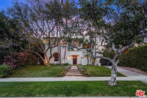 Exclusive and secured 1930's Mediterranean residence nestled in sought-after Little Holmby. This delightful abode boasts original features throughout, including refined moldings, authentic tiles, and artisan-crafted doors. Step into the captivating c...