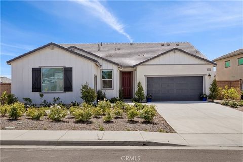 Step inside this immaculate and beautiful nearly new, single level home located in the heart of a highly desirable luxury community in Wildomar. Prepare to be captivated by the open-concept living space, adorned with sleek tile floors, plush carpetin...