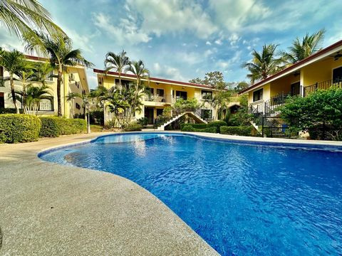 Discover the perfect blend of comfort and convenience with this delightful condo located in the sought-after Tropical Waves complex within the 