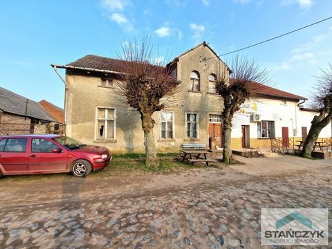 The subject of the sale is half of a house for general renovation, located just 10 minutes of quiet drive from the center of Trzebiatów - to the seaside beach it is only 17 kilometers - peace and quiet. Arrange viewing by phone at The property is loc...