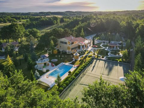 This unique estate is situated in the beautiful nature of central Istria, not far from major roads, surrounded by the tranquility and peace of a private forest on 4 hectares of land. The large plot is carefully landscaped and thoughtfully designed, l...