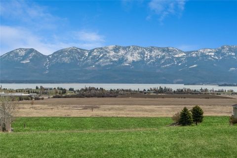 Experience breathtaking, panoramic views of the Mission Mountains and Flathead Lake from this exceptional location within the Pheasant Hills community, aka Stone Wall Estates. A generous .617 acres offers an opportunity to create your ideal home whil...