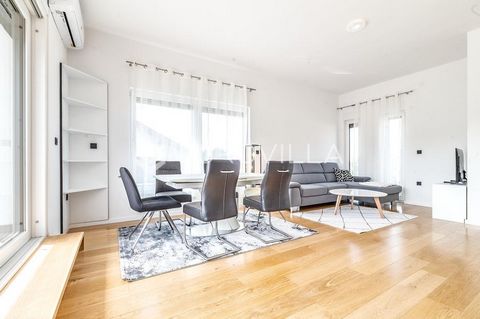 Maksimir, a two-story, two-room apartment with an area of 113 m2 on the first floor of a well-built urban villa from 2024 without an elevator. It consists of an entrance hall, a spacious living room, an open floor plan kitchen and dining room with ac...