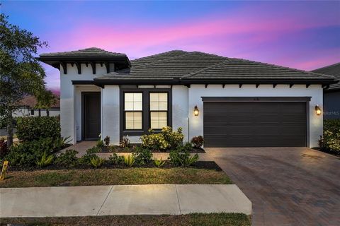 Welcome to your dream home in the prestigious gated neighborhood of Worthington in Sarasota. This stunning 4-bedroom, 2-bathroom residence, built in 2021, offers contemporary living with luxurious upgrades and a prime location with NO CDD!! Situated ...