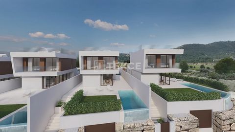 Villas Individuelles de 3 Chambres à Distance de Marche du Terrain de Golf à Finestrat Alicante Les villas individuelles de luxe sont situées à Finestrat Alicante, dans la Communauté valencienne, au sud-est de l'Espagne. Finestrat se trouve au bord d...