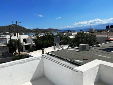 Elounda - Agios Nikolaos Two apartments for sale on the first floor with a total area of 100 sq.m. in the center of Elounda just 200 meters from the beach. The first apartment is 68 sq.m. and consists of a living room with fireplace, kitchen, two bed...