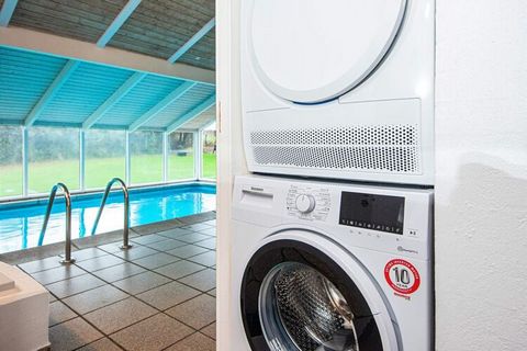 Holiday cottage with swimming pool, whirlpool and sauna overlooking the sea with wonderful location approx. 100 m from the sandy beach. You can relax in the whirlpool, take a swim in the pool or simply just enjoy the silence. The kitchen, which has b...