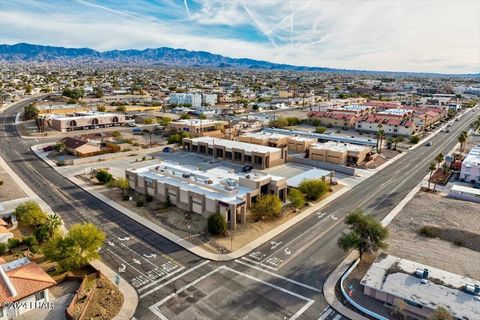 One of Nicest Multi-Tenant Medical/Office Buildings in Lake Havasu City. Currently 100% leased. This is a INVESTOR/FUTURE USER OPPORTUNITY. There are two seperate buildings totaling 12,335 sq/ft on two parcels adding up to 1.22 acres. Building #1 con...