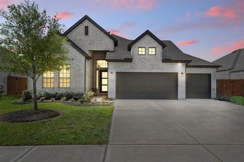 GRAND OPENING! OPEN HOUSE SATURDAY APRIL 13TH & SUNDAY APRIL 14TH FROM 12:00PM-4:00PM! Welcome home to 624 Santa Rose Hills located in the master planned community of Suntrace and zoned to Katy ISD! Indulge in the epitome of luxury living with this s...