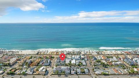 Just steps from the beach! This luxury seaside residence boasts over 2400 sq. ft. of living space and seamlessly fusesquality and impeccable finishes with a modern touch! Enjoy panoramic views of the coastline and stunning sunset viewsfrom two upper ...