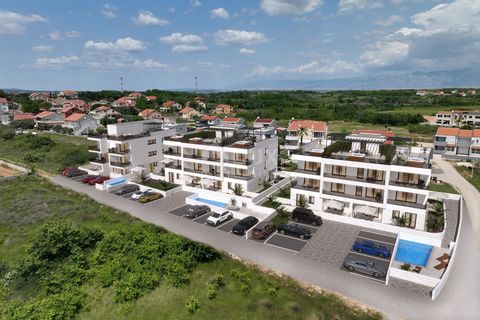 Location: Zadarska županija, Privlaka, Privlaka. DALMATIA, PRIVLAKA New construction with sea view! An apartment in a new project is for sale in a fantastic location, one minute from the sea! The apartment in question is located on the first floor an...