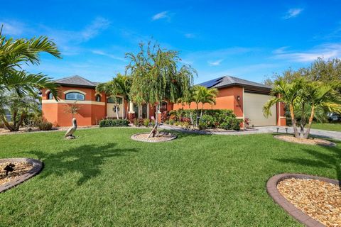 Price Improvement, Sellers Motivated! Rare opportunity alert! Additional lots included! Immerse yourself in Florida living with this exquisite turnkey Gulf-access waterfront SMART home located in Port Charlotte. Enjoy breathtaking sunset views from y...