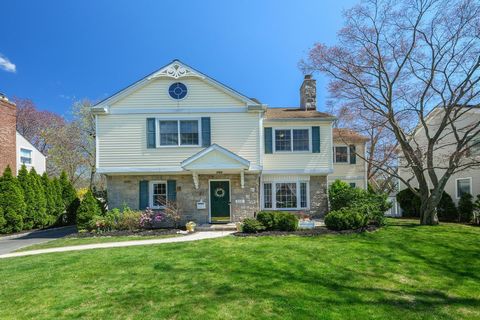 Welcome to this bright and airy home nestled in the heart of Eastchester, situated on a beautiful, level lot with inviting curb appeal, lush landscaping, and a desirably quaint street. The main level features a nice open flow with a sun-drenched livi...