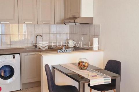 Dugi rat, studio apartment NKP 32.65 m2 in the immediate vicinity of the sea. The apartment consists of a hallway, bathroom and kitchen, dining room and a double bed as an open concept with access to a spacious balcony. The advantage of this apartmen...