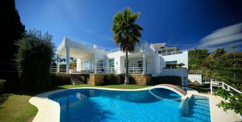 Sumptuous villa located on the hills overlooking La Concha, Golf Valley, Puerto Banus, with views across the Mediterranean and African coastline. The entrance hall is lined with beautiful Portuguese marble and leads to a modern and spacious 'split-le...