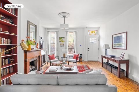 298 14th Street An elegant, turn of the century home, bright and charming with historic details like stained glass, restored working fireplace and original pine floors. The spacious living room is framed by an original floor to ceiling book case with...