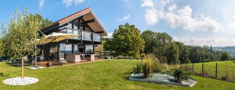 Contemporary 5 bedroom villa close to the lake...Located in the heart of a quiet, residential area, this beautiful 163 m2 contemporary villa from the Dunoyer group. Designed in wood and glass, this spacious villa features light and contemporary archi...