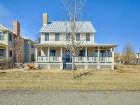 Carlton Landing home on the Corner of Boulevard and Boardwalk! This 4 bedroom home offers a unique set up with 2 primary suites on the MAIN level. Gorgeous entertainers kitchen with generous living, dining and side screen porch. Upstairs you will fin...