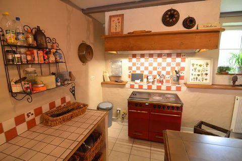 Cozy and cheerful, this is a 5-bedroom holiday home in Bi�vre, inviting you to the Belgian Ardennes region. There is a terrace with a barbecue to enjoy a sizzling platter in the evening. It is ideal for a family of 12 people or several smaller famili...