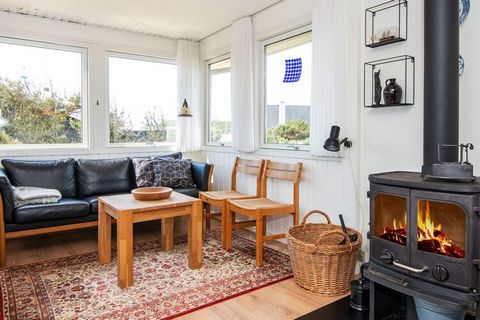 Holiday home located high with a fantastic view of nature over Søndervig golf course in the east and the dunes in the west. The house is located on a secluded dune plot within walking distance, only approx. 500 meters, to the fantastic North Sea with...