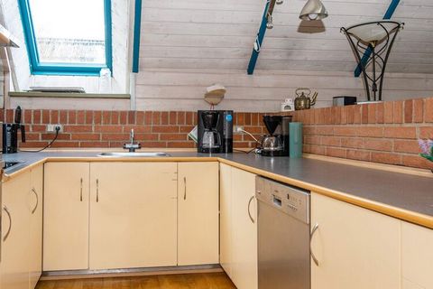 Very spacious holiday cottage with carefully arranged rooms. The mezzanine is a kind of first floor with a proper staircase and a good floor-to-ceiling height. The cottage is located not far from Juelsminde and approx. 400 metres from the sea. Juelsm...