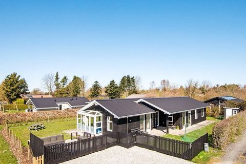 Holiday home with indoor pool and sauna located in a child-friendly and well-established holiday home area in Pøt Strandby. There is a good living room in open connection with the kitchen and four good bedrooms, one with entrance through the pool roo...