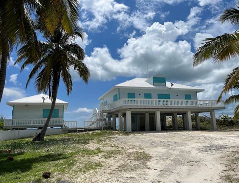 This is your chance to own one of the most coveted homes on Great Harbour Cay which happens to be located on the best powdery white sand beach! The main house is elevated with stunning panoramic views of the crystal-clear turquoise waters that The Ba...