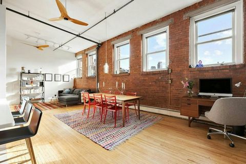 Welcome to this spacious, true duplex loft in the iconic Skytrack condominium, situated amongst the brownstones and leafy streets at the border of the Boerum Hill and Cobble Hill neighborhoods. The entrance to this gracious unit is on the third floor...