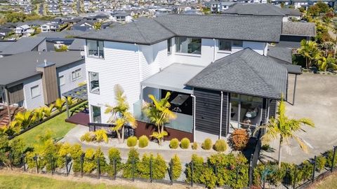 Experience coastal living at its finest in this remarkable residence perched on an elevated 650m2 section, offering views of the serene estuary & expansive sea vistas. Step into luxury as this stunning 403m2 abode seamlessly blends indoor & outdoor l...