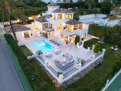 Extraordinary newly-renovated villa boasting captivating architecture and interiors in an enviable location. Nestled within the prestigious gated community of Los Naranjos Hill Club in Nueva Andalucia, this residence offers panoramic views of La Conc...