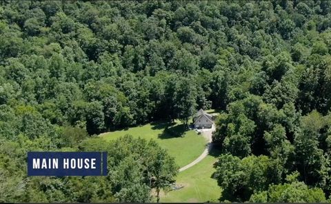 These 229 UNRESTRICTED acres are SECLUDED and PRIVATE! With TWO Custom Built Homes! The main home has plenty of space to house guests but there is an entire GUEST HOUSE as well! Along with 3 wells, 3 year round springs, a barn with 2 horse stalls and...