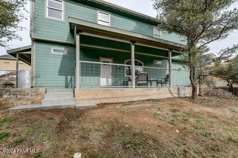 Discover your dream retreat in this custom-built haven nestled in lush oak and pine trees on just under an acre with seasonal creek, plenty of parking, FULL RV hookup, and NO HOA. Enjoy outdoor gatherings on the large porch or tree covered picnic are...