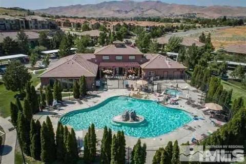 Lifestyle living at it's BEST!!!! This ground floor home is in desirable Silver Creek development close to the amazing clubhouse features meeting rooms, business center, resort style year round swimming pool and hot tub. Amenities include fitness fac...