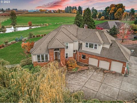 Majestic Mt Hood View, this 14+ acre estate offers exclusive Water Rights, highlighted by an 800,000+ gallon pond that brings in tons of wildlife. 13 Acres are irrigated and tiled. Zoned EFU, it's poised for diverse ventures? Would be a great event v...
