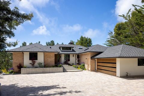 Located just up the hill from the world-famous Pebble Beach Lodge, this exquisitely designed modern home is the ultimate Pebble Beach haven. The property boasts impressive curb appeal with a grand entrance, spacious driveway, two-car garage, and beau...