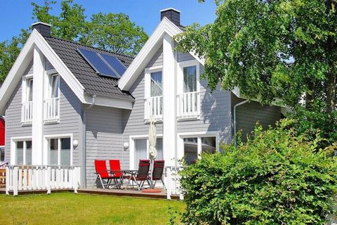 The semi-detached house in Scandinavian style with fireplace, infrared cabin and WiFi is located near the most beautiful sandy beach on Rügen. Your tastefully furnished accommodation is located in a small holiday complex, the Ostseepark. The kilomete...