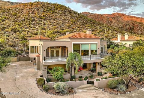 Elevator to second floor living and captivating views of the city and Coronado Forest from balconies and oversized windows! It's the BEST of FOOTHILLS living in this incredible home situated on .34 Ac in coveted gated Finisterra community. Discover a...