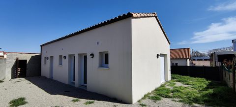 Loué - Immeuble de trois appartements de plain-pied + garages
