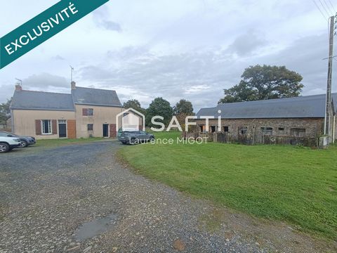Maison mitoyenne avec dépendances et fort potentiel