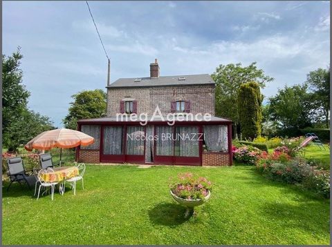 Belle maison en brique dans le pays d'auge orné