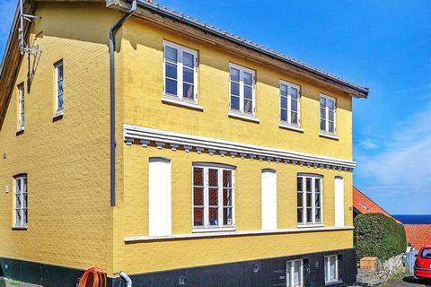 Well-located holiday apartment in the heart of Gudhjem town. The apartment is on the ground floor and with access to a small lawn with garden furniture. The sleeping accommodation is in the living room. It is decorated in a light, Scandinavian style....