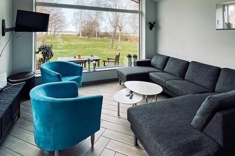 Holiday cottage overlooking the large plot and the fjord. The space has been well-appointed with modern settings. Low-cost geothermal heating throughout. The kitchen has everything needed for preparing a good dinner and is in open concept with the li...