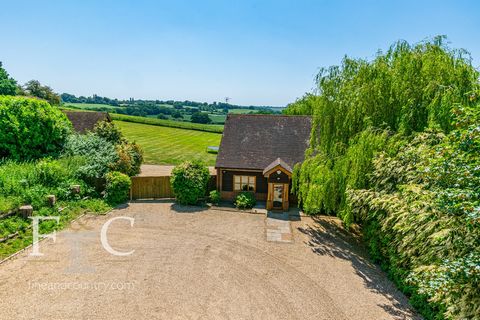 Designed and built by the current owners creating a stunning retreat and boasting some of the finest views in the area. Summer House offers a vast amount of accommodation both inside and out. The main house is a well planned contemporary property wit...