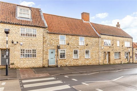 A rare chance to purchase a charming, greatly extended, totally refurbished, stone cottage dating to 1717 which nestles between other historic properties in a conservation area in the heart of the much sought after Lincolnshire Cliff village of Naven...
