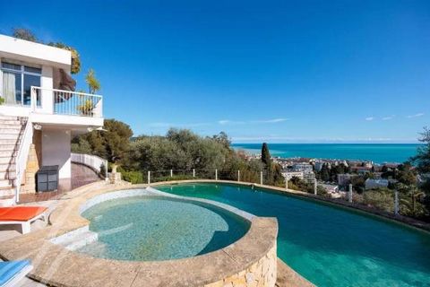 Nestled in a private estate, this vast contemporary residence enjoys an exceptional location, in the quiet and dead-end complex and so close to the town center. South-facing, it boasts spectacular panoramic views of the sea, mountains and town. The p...
