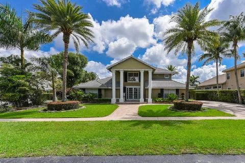 Greenview Cove/ Polo West Estates, Wellington, Florida -'Exclusive opportunity to own this stately water front home in Wellington's Polo West Estates. The inside features include a first floor master suite, high end appliances, travertine floors, gor...