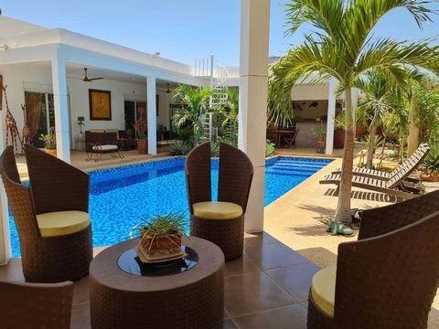 Ideally located in the heart of Saly, next to the Rhino hotel with all amenities on foot, 800 meters from the beaches, in a very quiet and residential area. House with LAND TITLE on its land of 1000 m² with swimming pool, composed of: 4 bedrooms with...