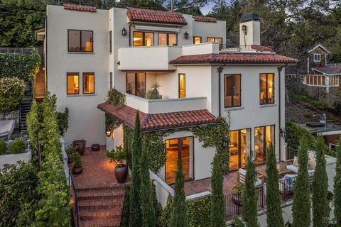 Nestled in the flats of Downtown Mill Valley, this exceptional property spans a south-facing lot, with street-to-street access, inheriting inspiring SF, Bay, and valley views. The elegance of this 4-bedroom, 4-bathroom home, offering over 4,000 squar...