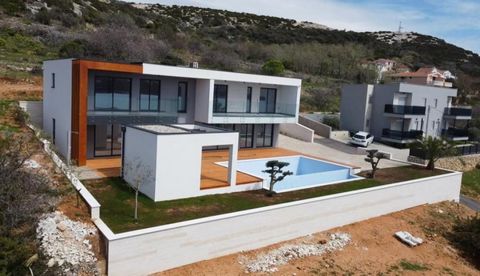 New modern villa in Stara Novalja, Pag peninsula - 100 meters from the sea! Total area is 276 sq.m. Land plot is 710 sq.m. On the ground floor of the villa, there is an entrance area, a spacious living room with a kitchen, a bathroom, a storage room,...